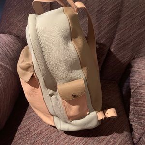 Pre owned custom made Roots backpack